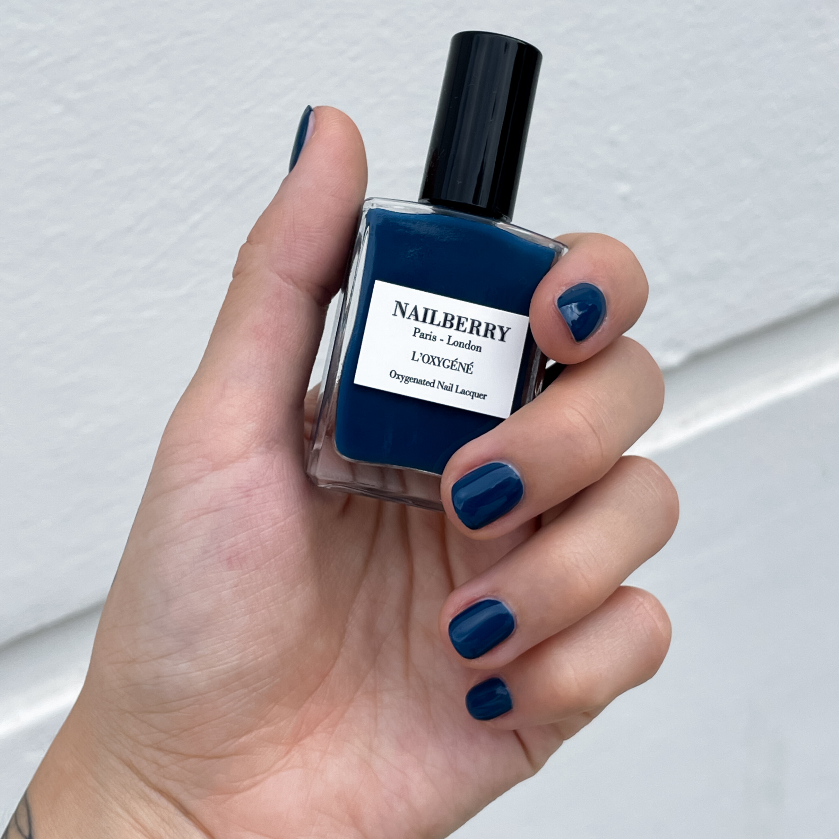 NBY255 Orage swatch with bottle